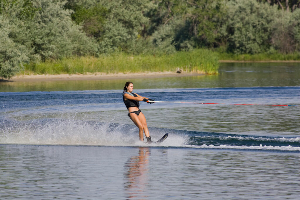 A woman waterskies