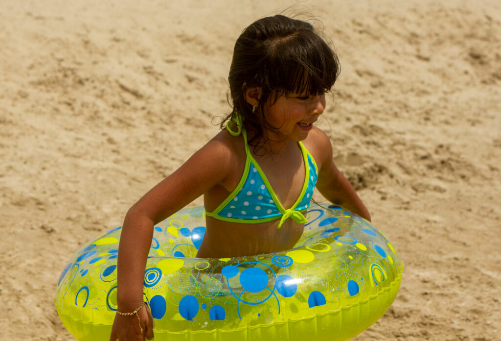 Fun on the beach at Lake McConaughy. Copyright NEBRASKAland Magazine, Nebraska Game and Parks Commission.