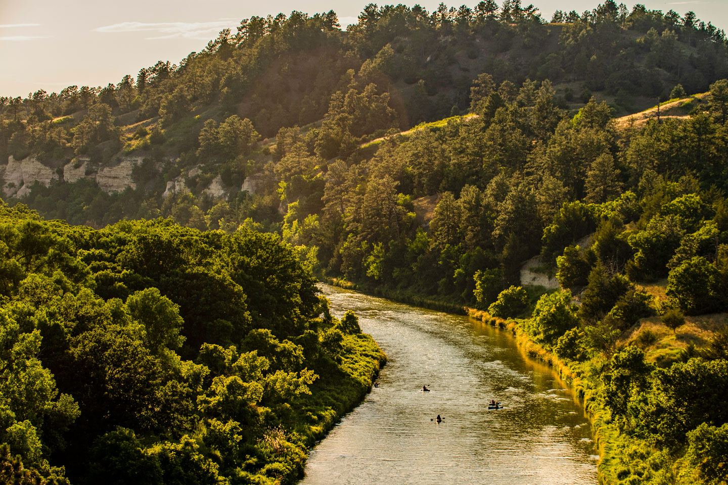 Kayaks head down the Niobrara National Scenic River at Fort Niobrara.