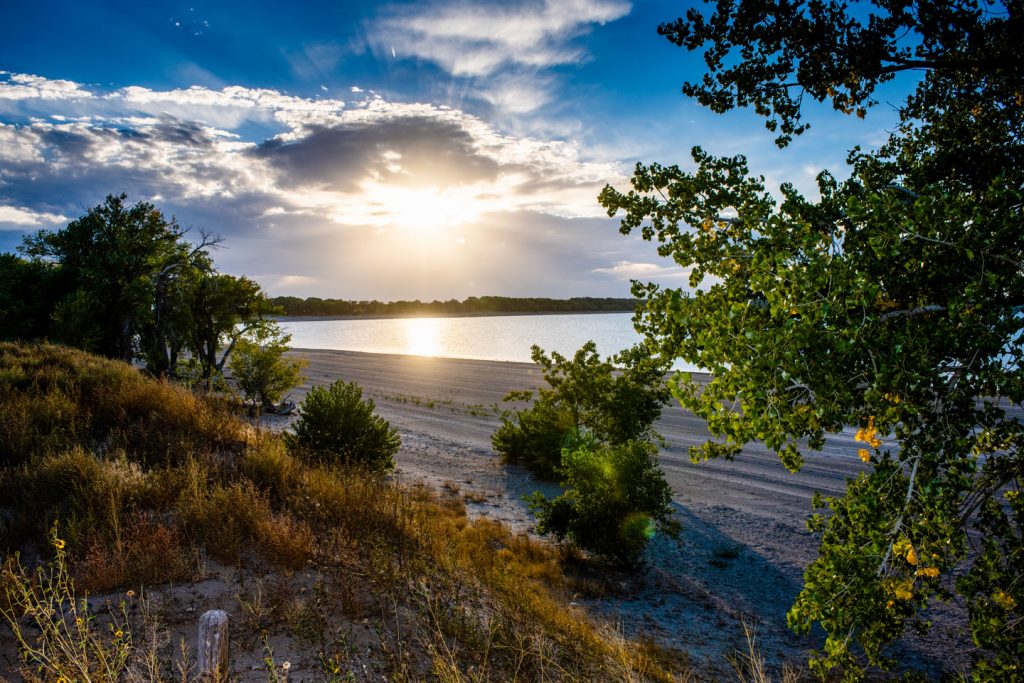 Sunset at Sunrise Beach, Lake Minatare State Recreation Area in Scotts Bluff County. Haag, Sept. 20, 2022. Copyright NEBRASKAland Magazine, Nebraska Game and Parks Commission.